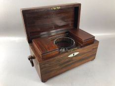 Antique tea caddy on bun feet with wooden circular handles, mother of pearl escutcheon. Two internal