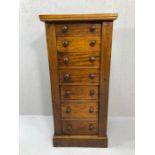 Mahogany specimen cabinet of seven graduated drawers with bun handles, approx 49cm x 36cm x 105cm