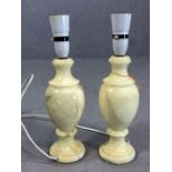 Pair of onxy baulster lamps, approx 34cms tall