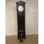 Grandfather clock with oval bevel edged glass window to movement, silvered dial with gold hands