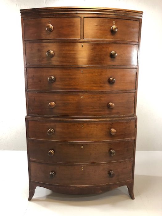 Mahogany bow fronted chest on chest of eight drawers, with turned bun handles, raised on bracket - Image 13 of 15