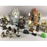 Large collection of eastern, Chinese and Japanese figurines/ Buddha's in various materials and