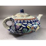 Chinese hand painted and enamel teapot with Dragon detailing and the flaming Pearl, unusual indented