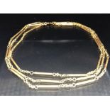 Gold Necklace approx 74cm in length half of which has a double strand comprising four links and a