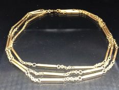 Gold Necklace approx 74cm in length half of which has a double strand comprising four links and a