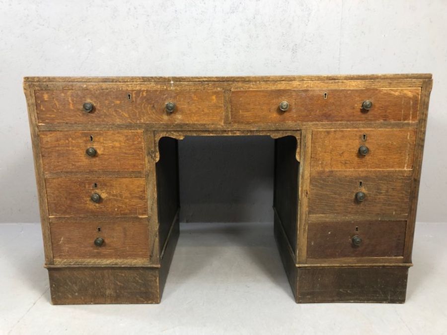 Harvey Nichols 1930s oak twin pedestal kneehole desk with eight drawers and green leather top, - Image 2 of 16