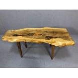 Retro driftwood style coffee table on tapered legs, approx 92cm x 39cm x41cm tall