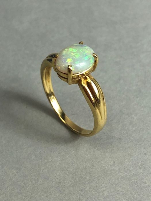 18ct Gold ring set with a cushion cut Opal approx 7mm x 9mm in a four claw setting size approx 'N' & - Image 3 of 5