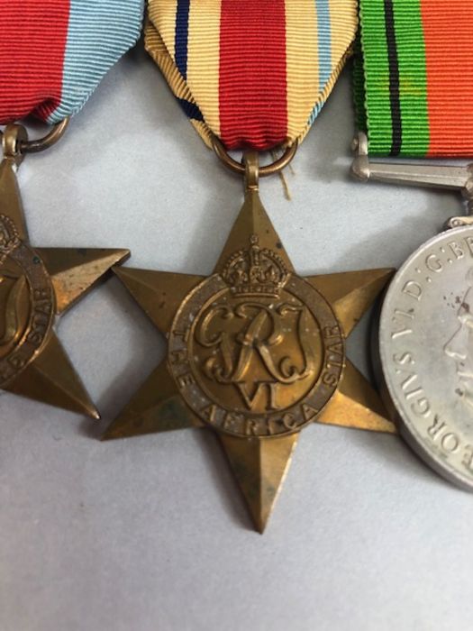 Medals: WWII medal set comprising Africa Star, Defence medal, War medal and 1939-45 star with bar - Image 3 of 8