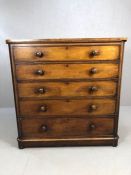 Antique mahogany chest of five drawers, one extra deep at base and one at top to include pull-out