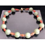 Coral and possibly jade necklace with silver magnetic clasp approx 41cm in length