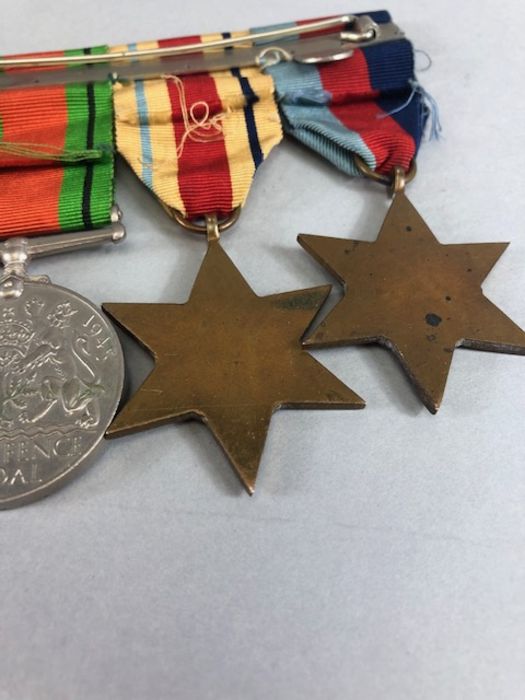 Medals: WWII medal set comprising Africa Star, Defence medal, War medal and 1939-45 star with bar - Image 8 of 8
