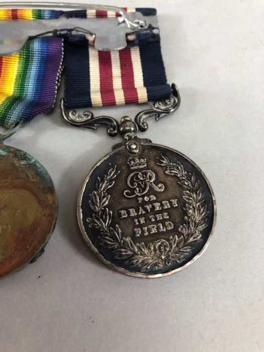 Medals: Collection of four WWI medals, trio of medals plus the George V FOR BRAVERY IN THE FIELD - Image 11 of 16