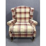 Laura Ashley Southwold raspberry check reclining wingback armchair, on brass front castors