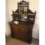 Mahogany buffet or chiffonier with cupboard and drawer under, bevel edged glass and upstand,