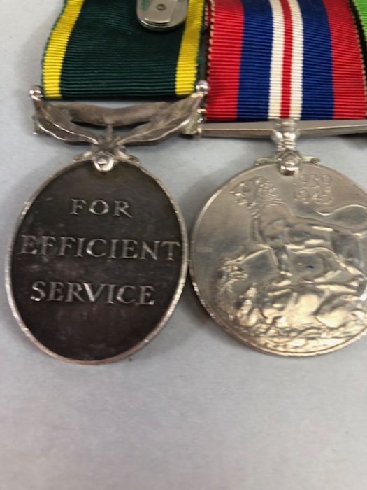 Medals: WWII medal set to include The Burma Star, Defence & War medals and the Territorial Army - Image 8 of 15