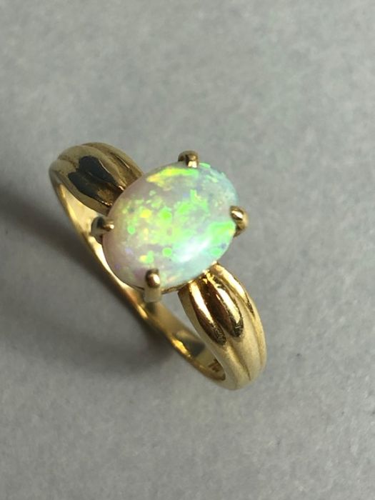 18ct Gold ring set with a cushion cut Opal approx 7mm x 9mm in a four claw setting size approx 'N' & - Image 2 of 5