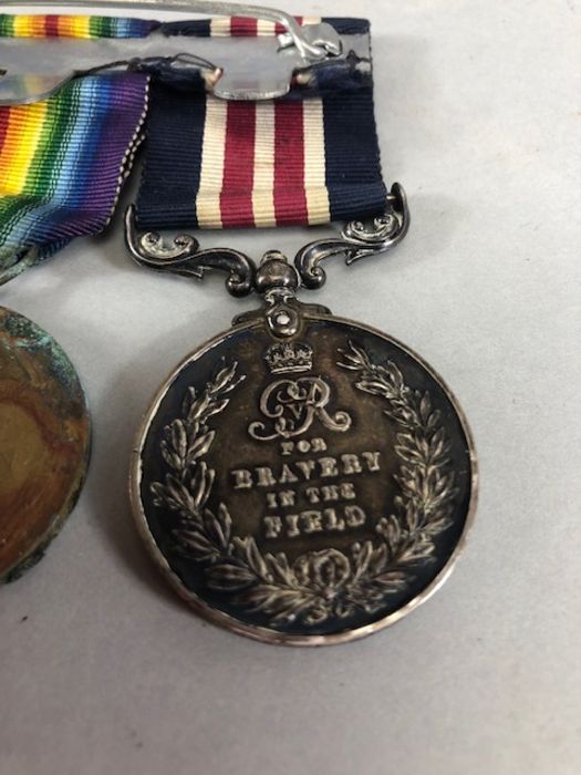 Medals: Collection of four WWI medals, trio of medals plus the George V FOR BRAVERY IN THE FIELD - Image 12 of 16