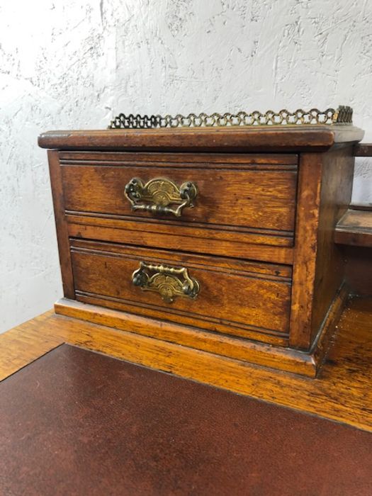 Antique writing desk on turned legs and castors with burgundy leather insert and gallery with - Image 8 of 17