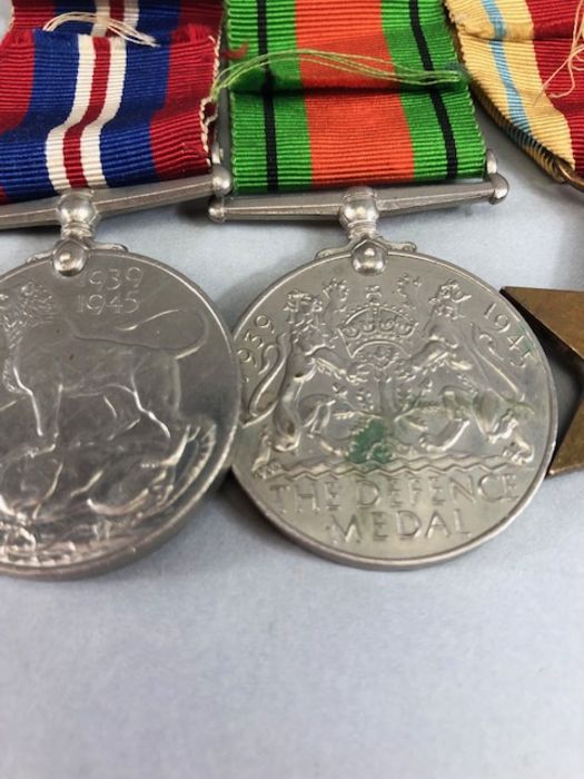 Medals: WWII medal set comprising Africa Star, Defence medal, War medal and 1939-45 star with bar - Image 7 of 8