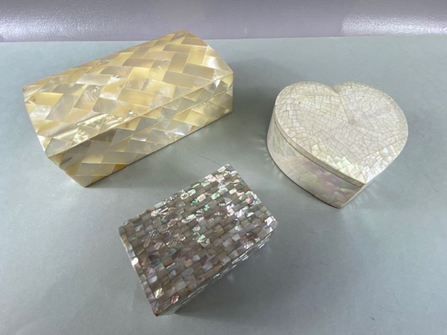 Collection of three mother of Pearl trinket boxes or Jewellery boxes the largest 5.5 x 9.5 x 5cm