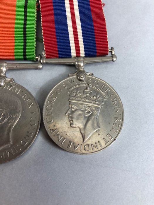 Medals: WWII medal set comprising Africa Star, Defence medal, War medal and 1939-45 star with bar - Image 5 of 8