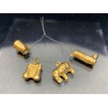 Collection of four 9ct Gold charms (approx 2.7g)