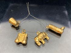 Collection of four 9ct Gold charms (approx 2.7g)