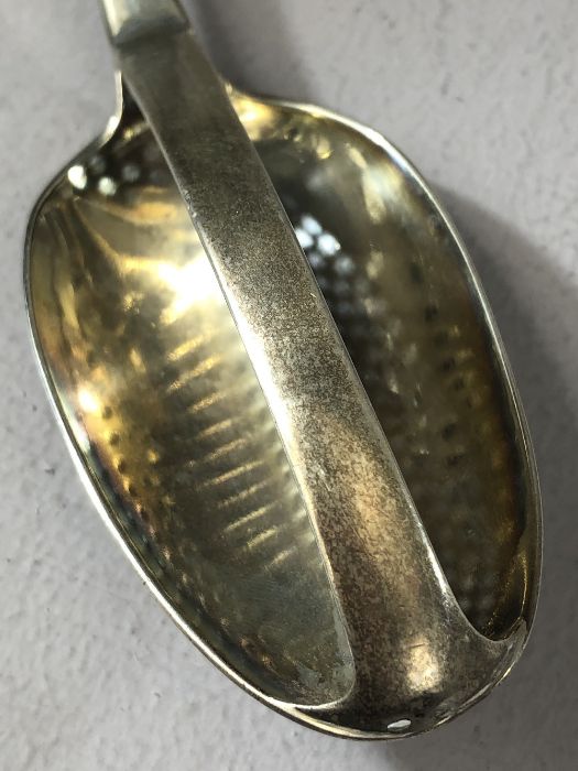 Solid Silver large straining spoon hallmarked for London, crest of a stag crown and cross dated 1774 - Image 3 of 8