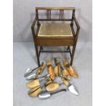 Collection of vintage shoe lasts, wooden and metal, with an inlaid hall seat