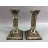 Pair of Victorian Corinthian column Silver hallmarked candlesticks on stepped and beaded filled