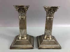 Pair of Victorian Corinthian column Silver hallmarked candlesticks on stepped and beaded filled