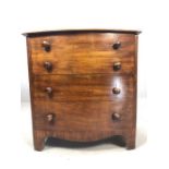 Victorian mahogany commode/bedside cabinet disguised as a small bow fronted chest of drawers, approx