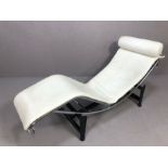 After Le Corbusier - ‘LC4’ adjustable chaise longue, white seat cushion and pillow over tubular