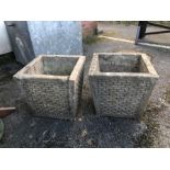 Two concrete garden planters