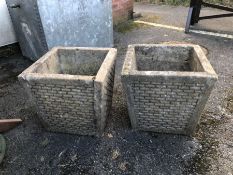 Two concrete garden planters