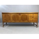 Mid century teak sideboard by Nathan, 'Circles' design, with two cupboards, one with drop down