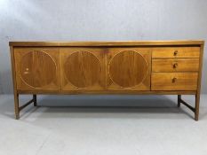 Mid century teak sideboard by Nathan, 'Circles' design, with two cupboards, one with drop down