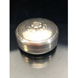 Georg Jensen silver pill box model 79D stamps to reverse with flower motif approx 36mm in diameter