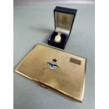 Gold Coloured cigarette case with the emblem and official motto of the RAF "Per Ardva Ad Astra"