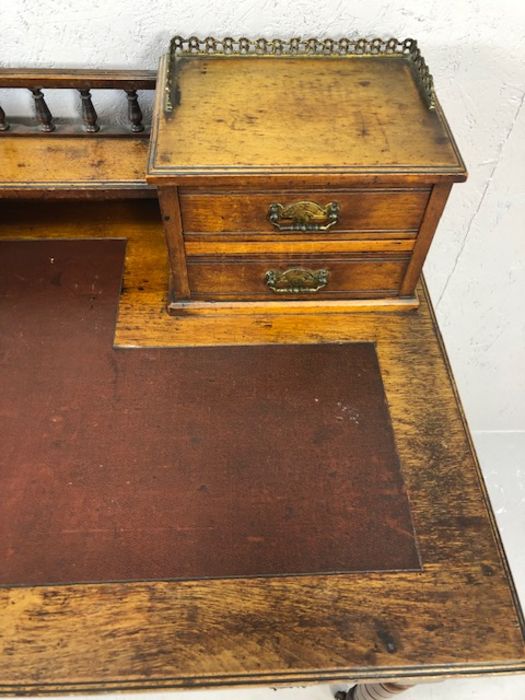 Antique writing desk on turned legs and castors with burgundy leather insert and gallery with - Image 5 of 17