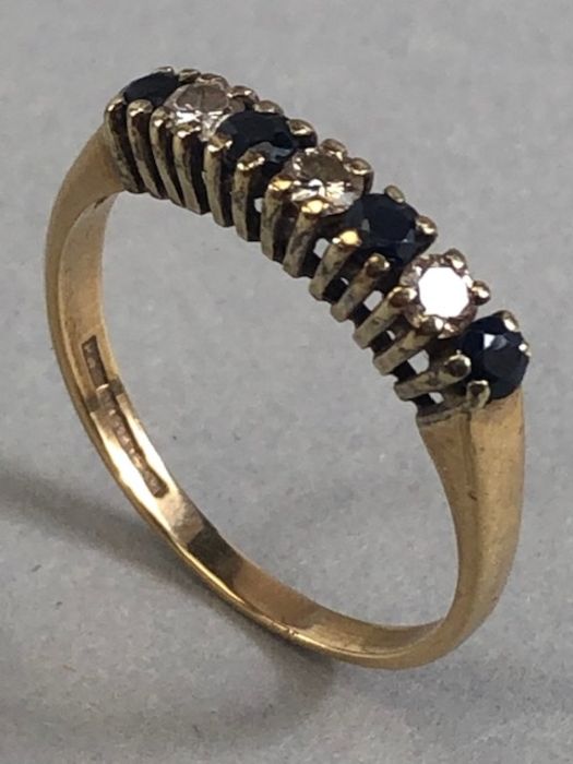 9ct Gold Diamond and Sapphire seven stone ring in claw settings approx size 'S' & 2.8g - Image 5 of 6