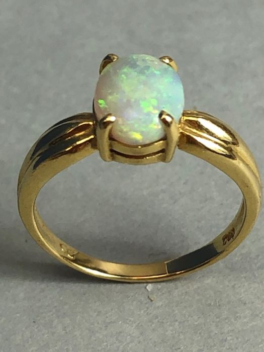 18ct Gold ring set with a cushion cut Opal approx 7mm x 9mm in a four claw setting size approx 'N' & - Image 4 of 5