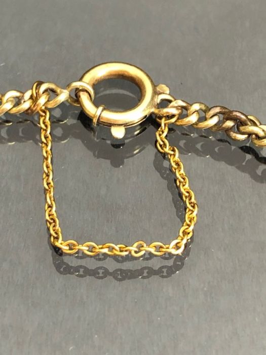9ct Gold Bracelet of link design and set with seven faceted garnets and with safety chain (total - Image 4 of 6