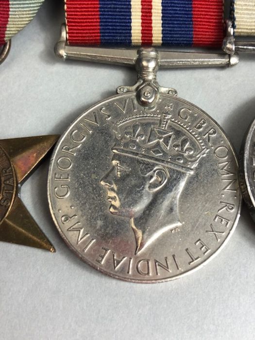 Medals: WWII Group of Navy Medals awarded to MX 61191 E. G. Munday. S. C. P. O. (V). HMS DRAKE To - Image 3 of 13