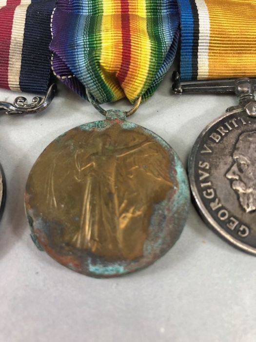 Medals: Collection of four WWI medals, trio of medals plus the George V FOR BRAVERY IN THE FIELD - Image 4 of 16