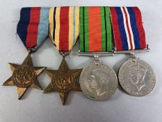 Medals: WWII medal set comprising Africa Star, Defence medal, War medal and 1939-45 star with bar