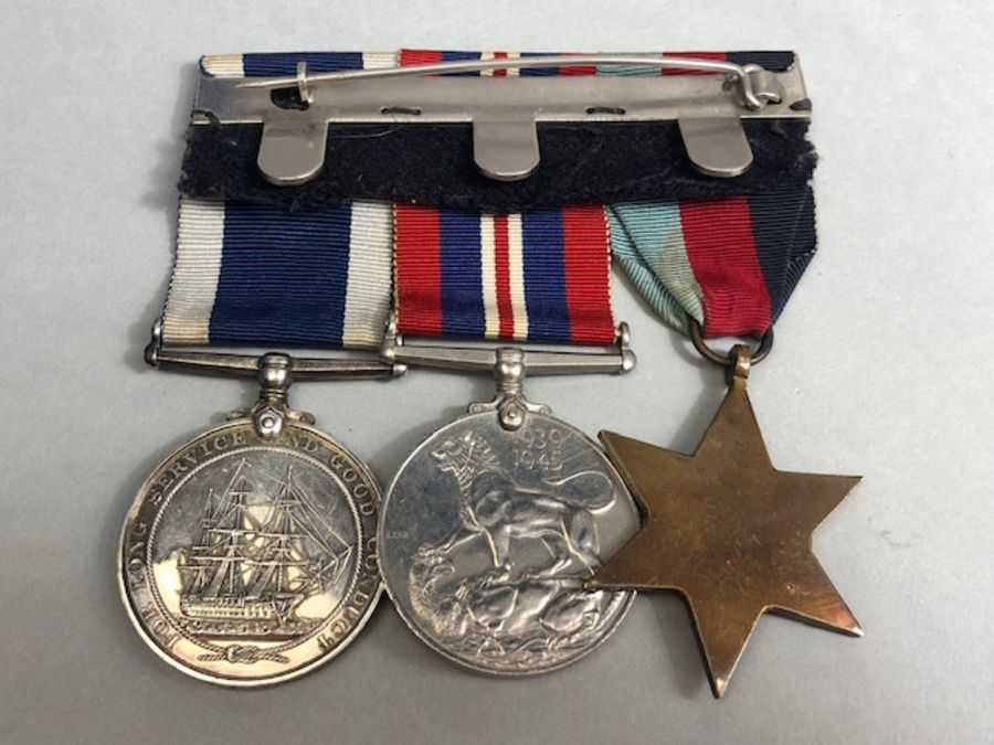 Medals: WWII Group of Navy Medals awarded to MX 61191 E. G. Munday. S. C. P. O. (V). HMS DRAKE To - Image 6 of 13