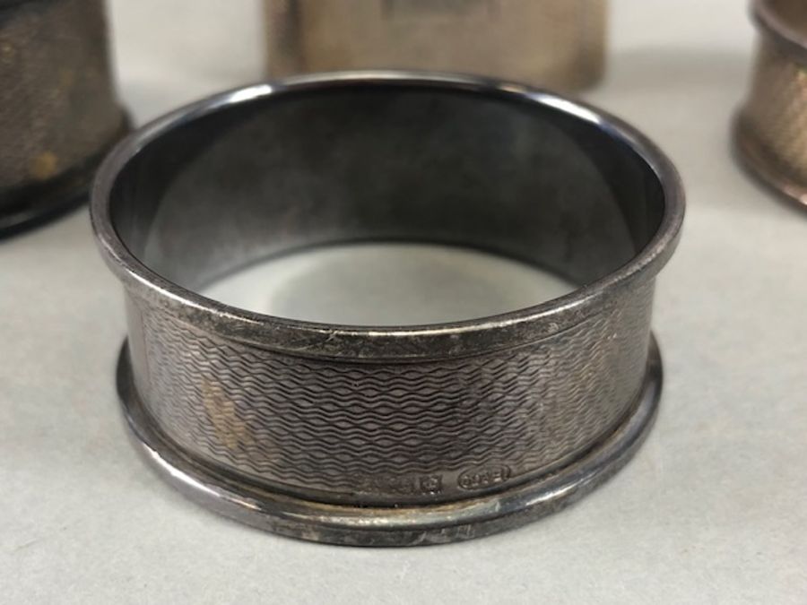 Collection of four silver hallmarked napkin rings total weight approx 55.5g - Image 3 of 14