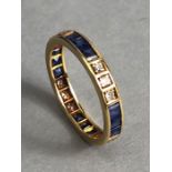 Yellow Gold Eternity ring set with alternate sets of three Diamonds and three square cut sapphires